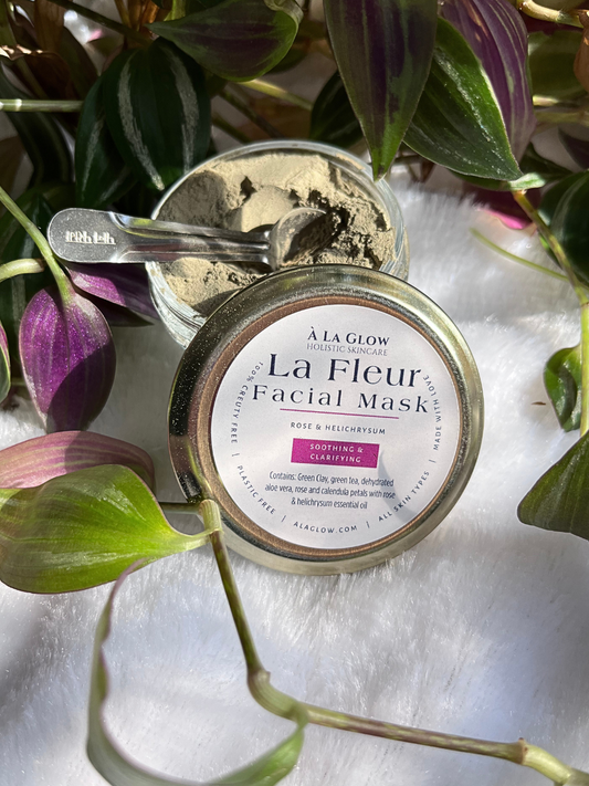 La Fleur Clay Mask with the Lid off, so you can see the smooth powder texture of the mask.  

